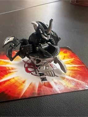 Bakugan Titanium Dragonoid 870G
Black Darkus Mechtanium Surge